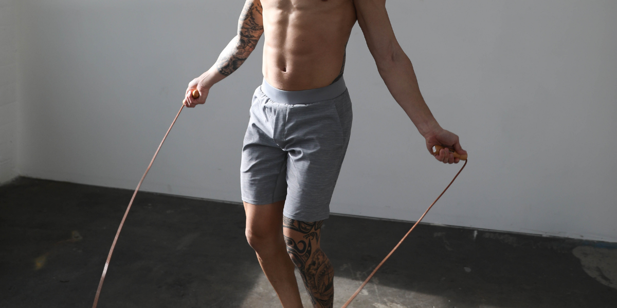 Shirtless man wearing Truwear running shorts